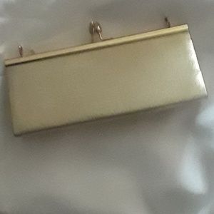 Gold clutch